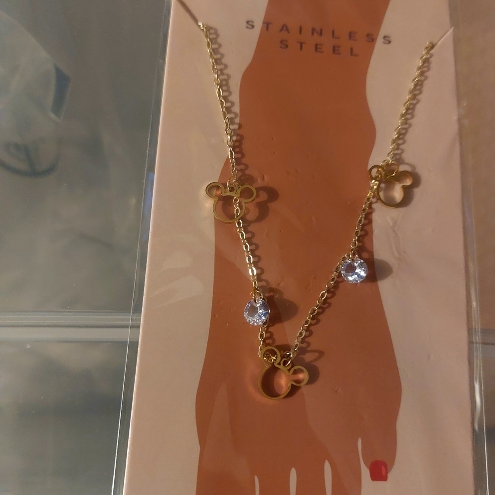 Summer ready with this Gold and Rhinestone Disney Stainless Steel anklet